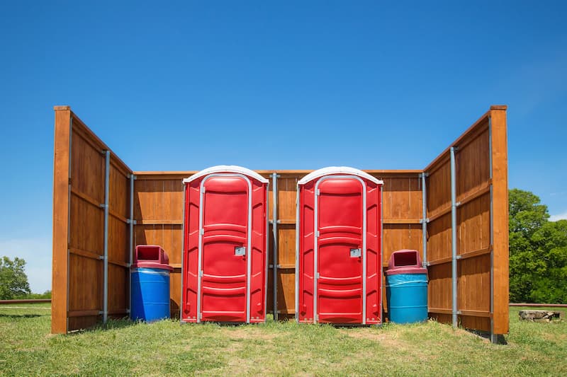 Short-term porta potty units staged for delivery in Richardson, Texas